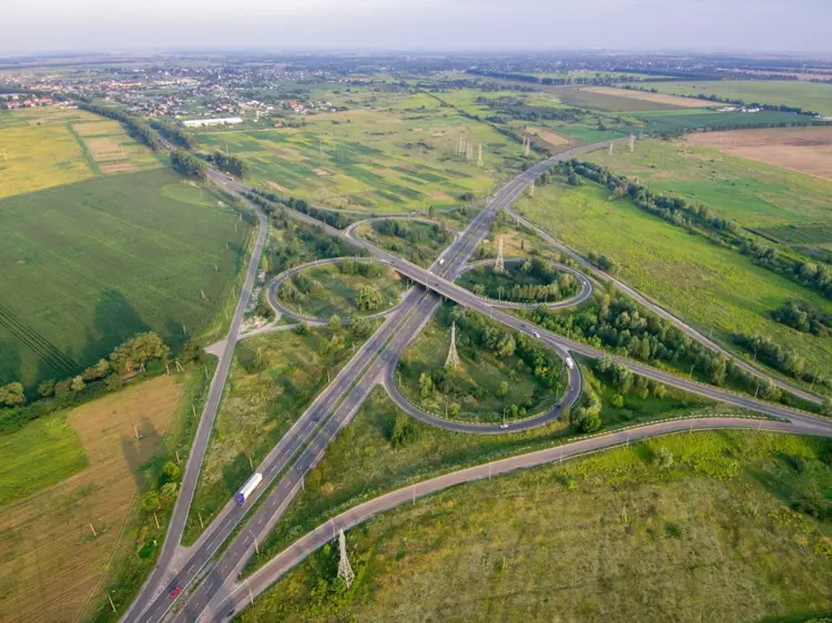 Cross highway skyline view showing multiple route options for planning the right road trip route.