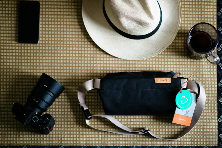 Essential road trip packing items neatly arranged on a table for smart and light travel.